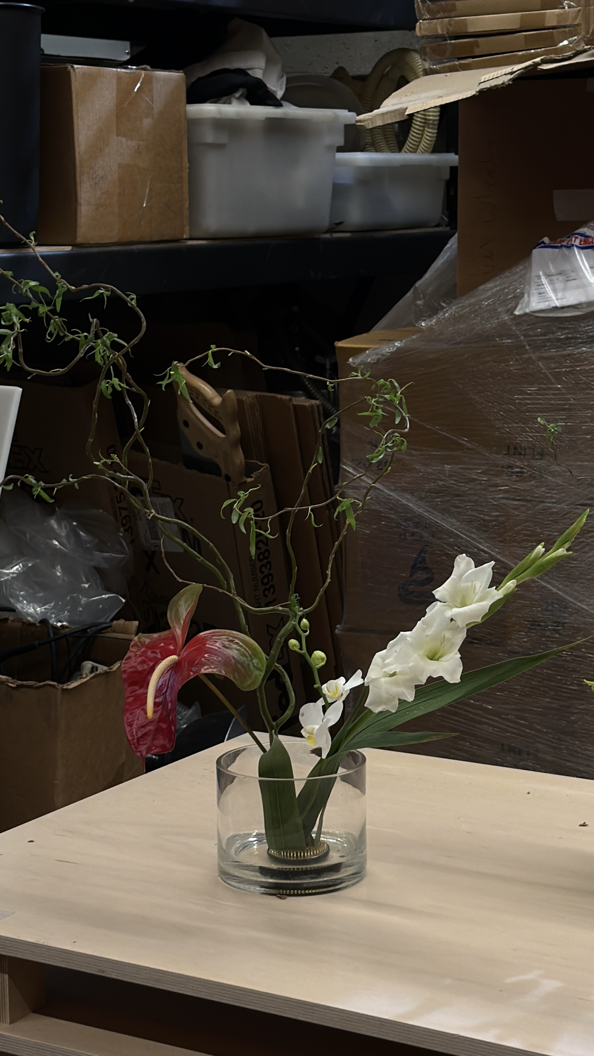 Workshop arrangement with anthurium and gladiolus